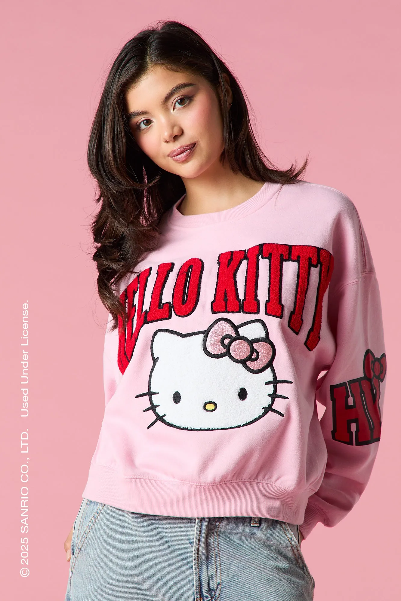 Hello Kitty® Chenille Embroidered Fleece Sweatshirt sold by Urban Planet