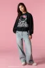 Hello Kitty® Glitter Graphic Fleece Sweatshirt sold by Urban Planet