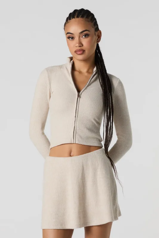 Jupe-short en tricot côtelé fluide sold by Urban Planet