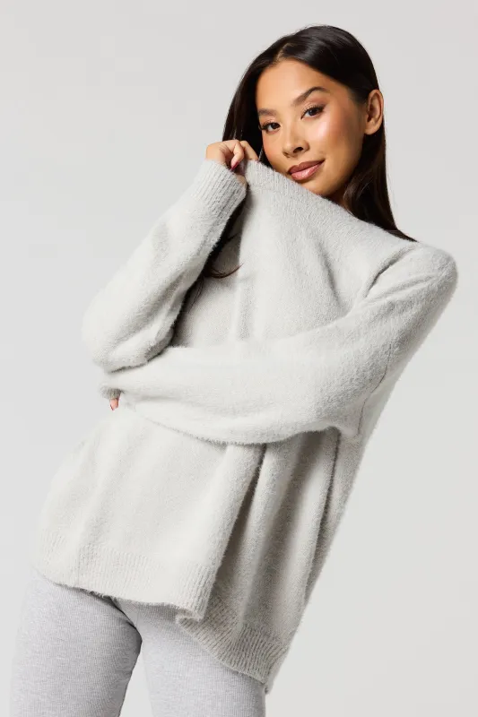 Fuzzy Knit Sweater sold by Urban Planet