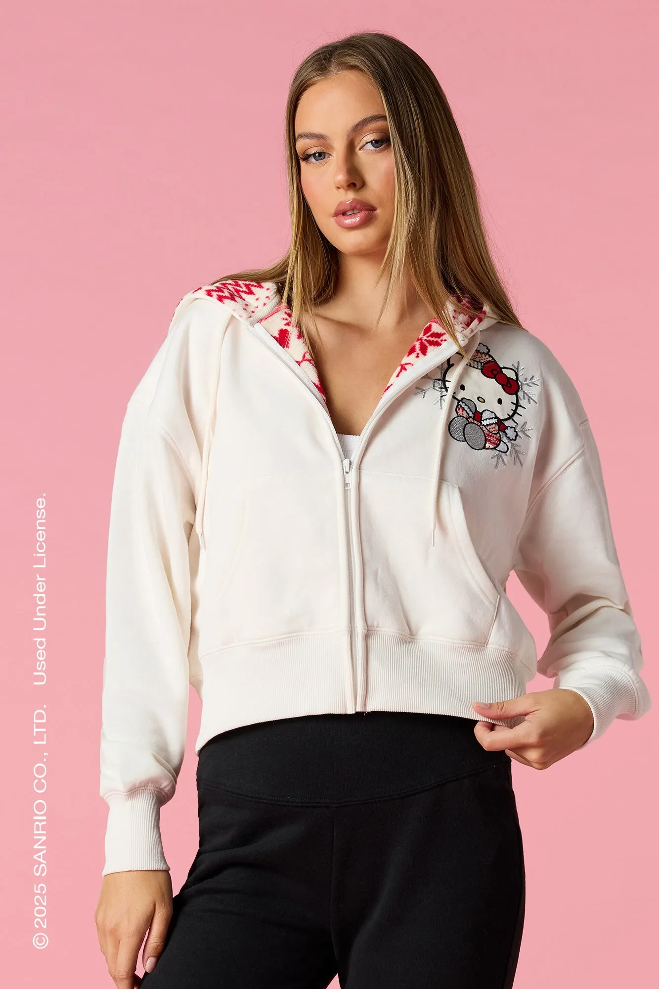 Hello Kitty® Holiday Embroidered Zip-Up Hoodie sold by Urban Planet