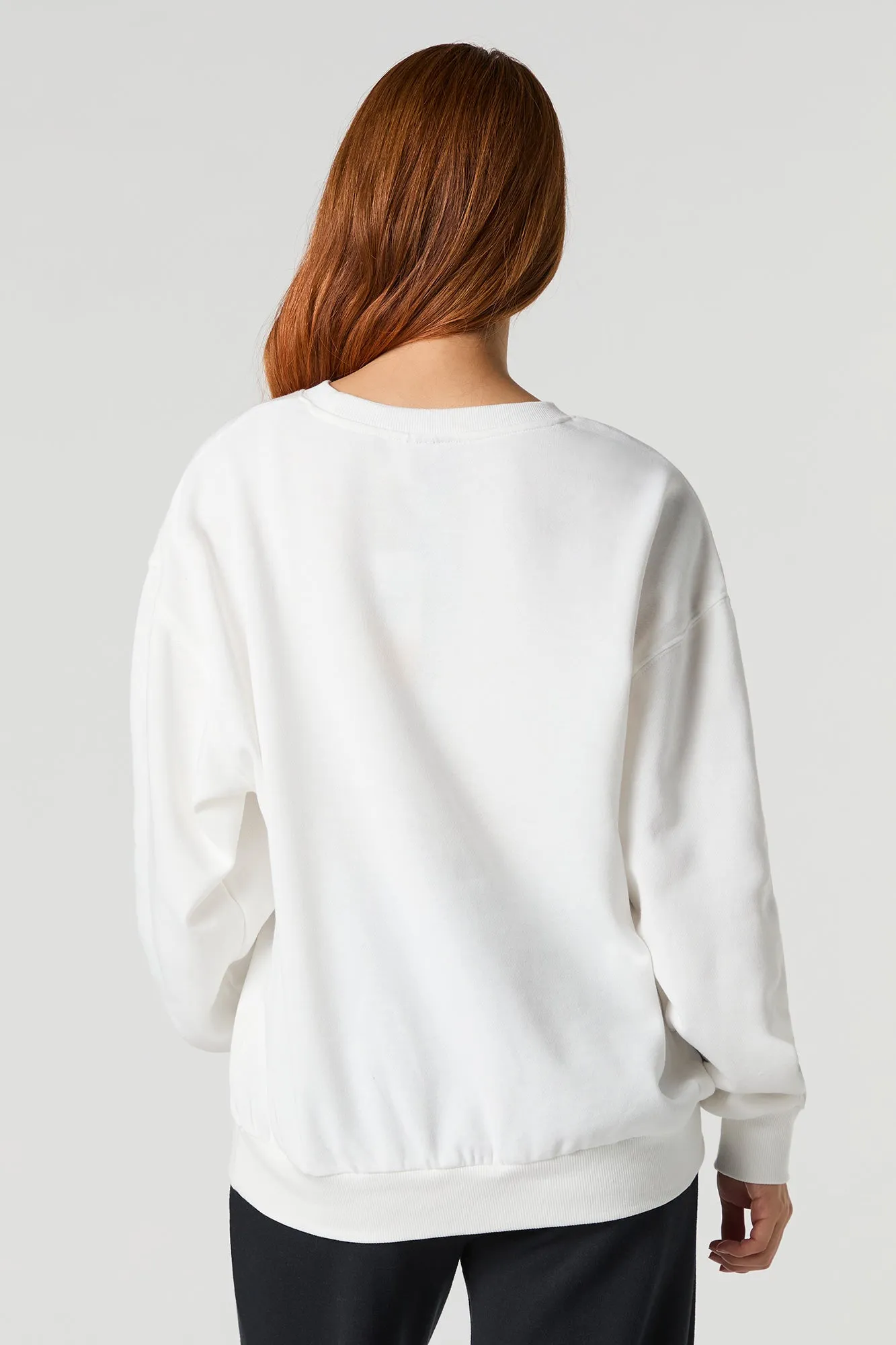 Peanuts Snoopy Silent Night Graphic Fleece Sweatshirt sold by Urban Planet product image thumbnail 2