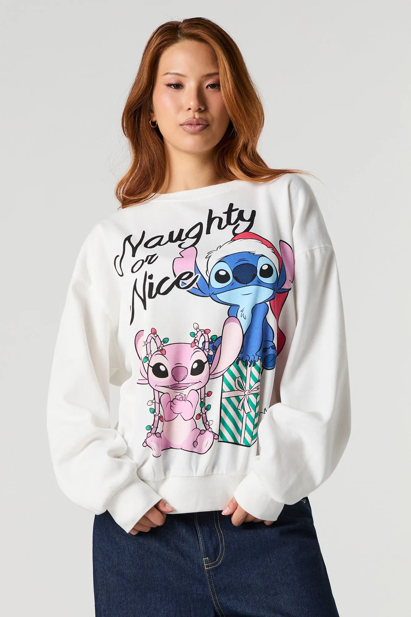 Stitch & Angel Christmas Graphic Fleece Sweatshirt sold by Urban Planet