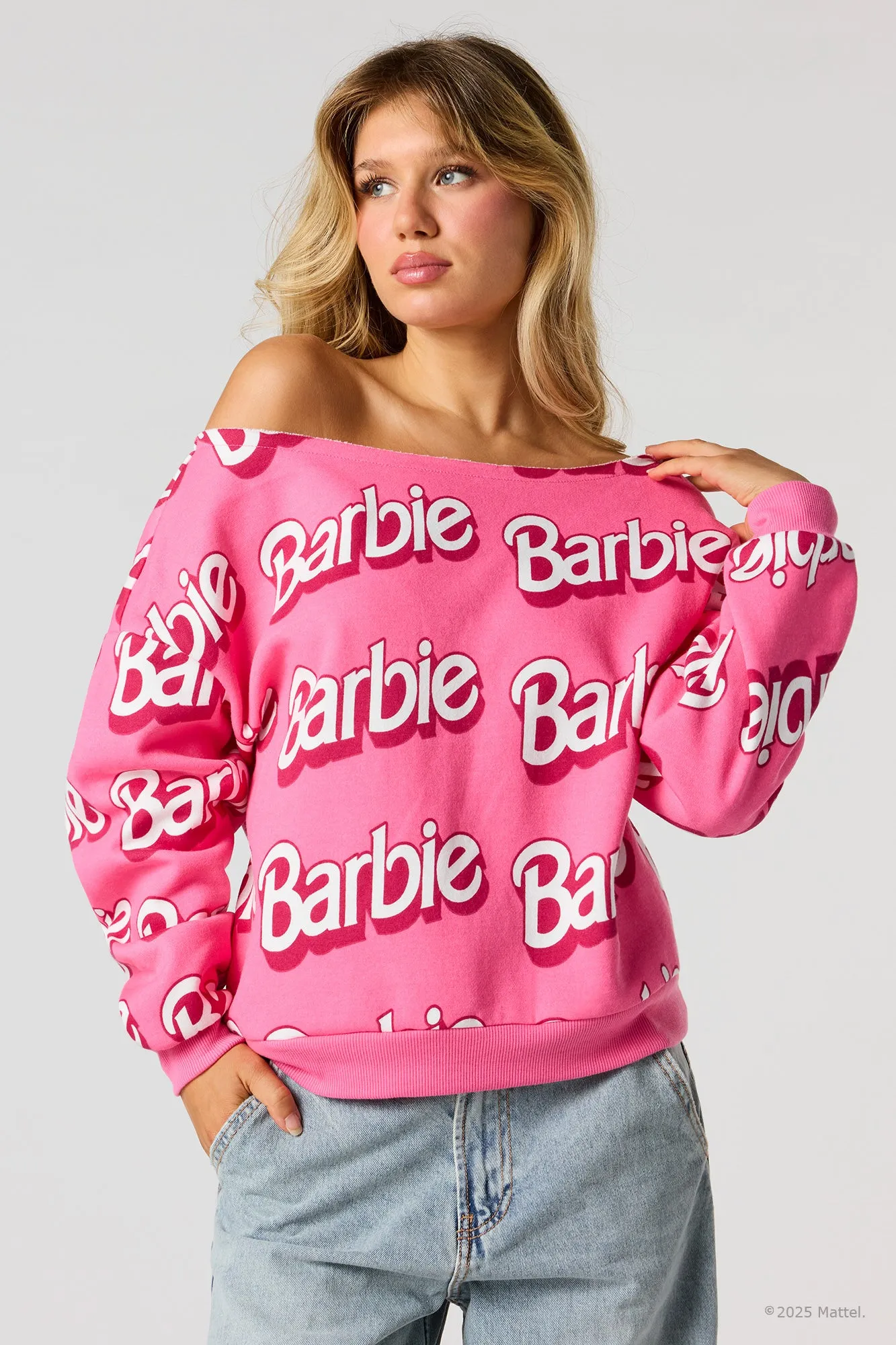 Barbie™ Off-Shoulder Fleece Sweatshirt sold by Urban Planet