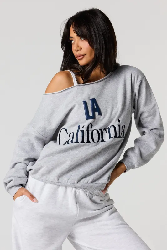 Destination Puff Print Off Shoulder Fleece Sweatshirt sold by Urban Planet