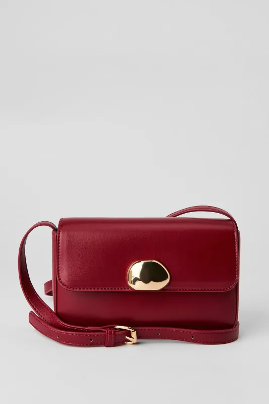 Faux Leather Metal Buckle Crossbody Purse sold by Urban Planet