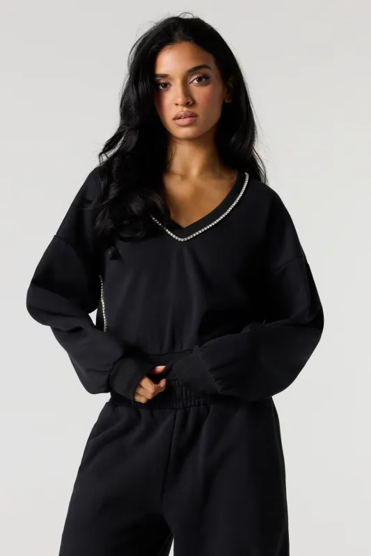 Rhinestone V-Neckline Fleece Cropped Sweatshirt sold by Urban Planet