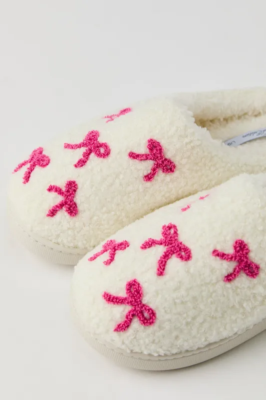 Bow Sherpa Slippers sold by Urban Planet