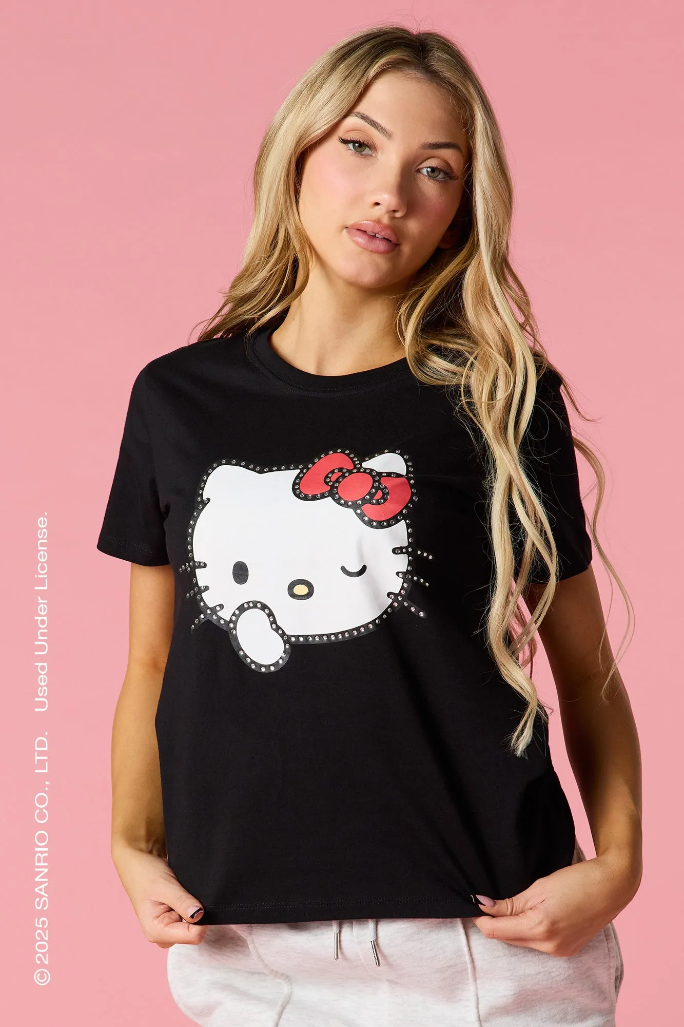 Hello Kitty® Rhinestone Graphic T-Shirt sold by Urban Planet