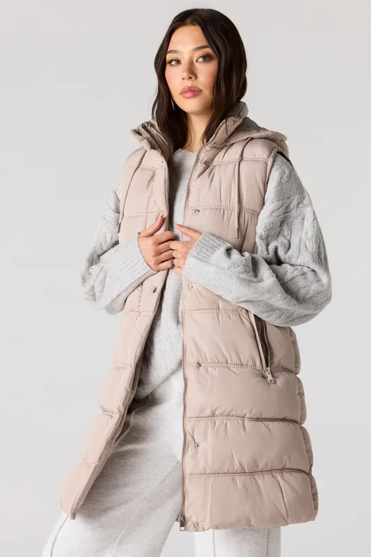 Long Puffer Vest sold by Urban Planet