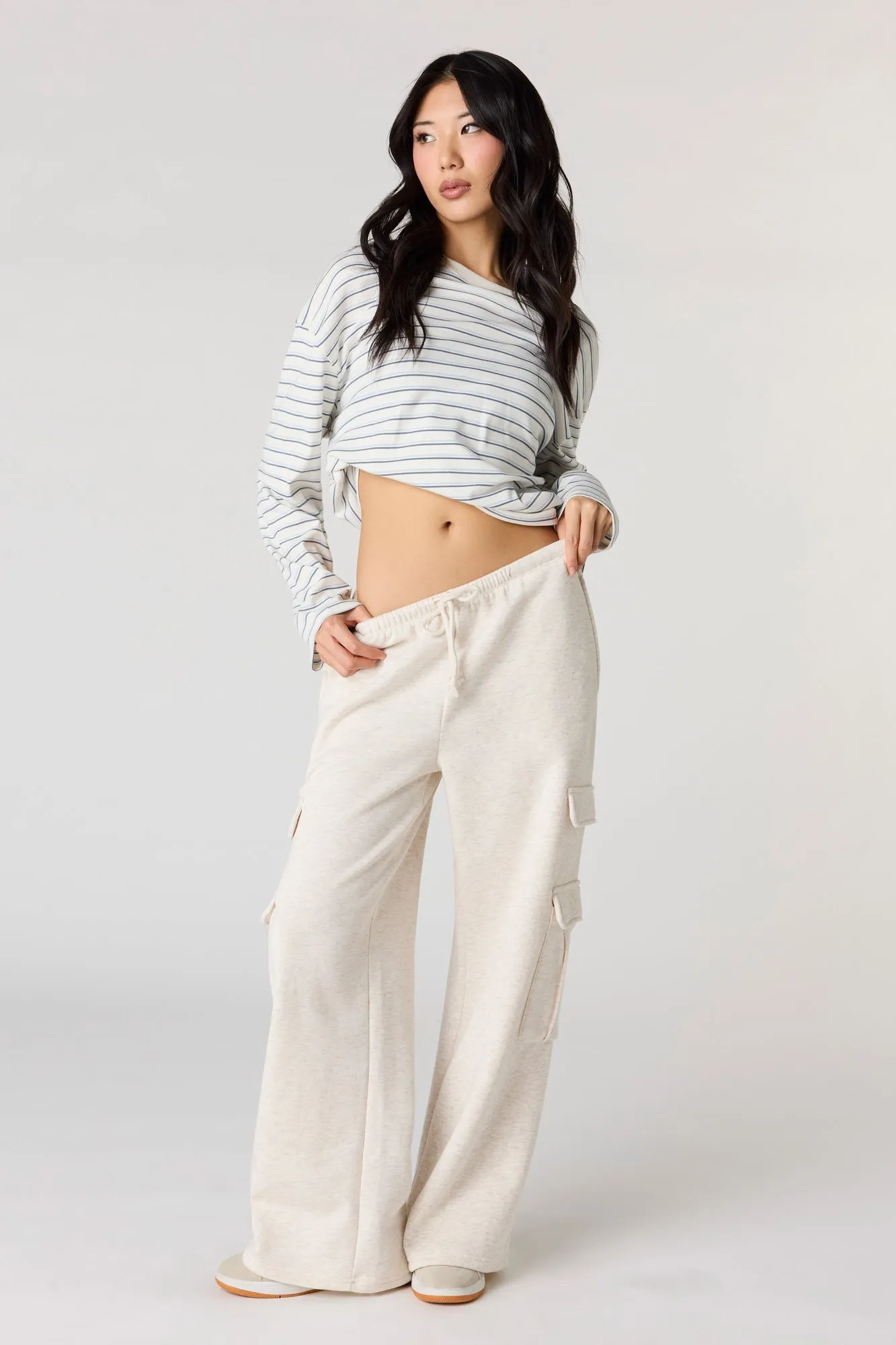 Fleece Low Rise Baggy Cargo Sweatpant sold by Urban Planet