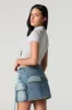Minijupe cargo en denim avec poches triples sold by Urban Planet