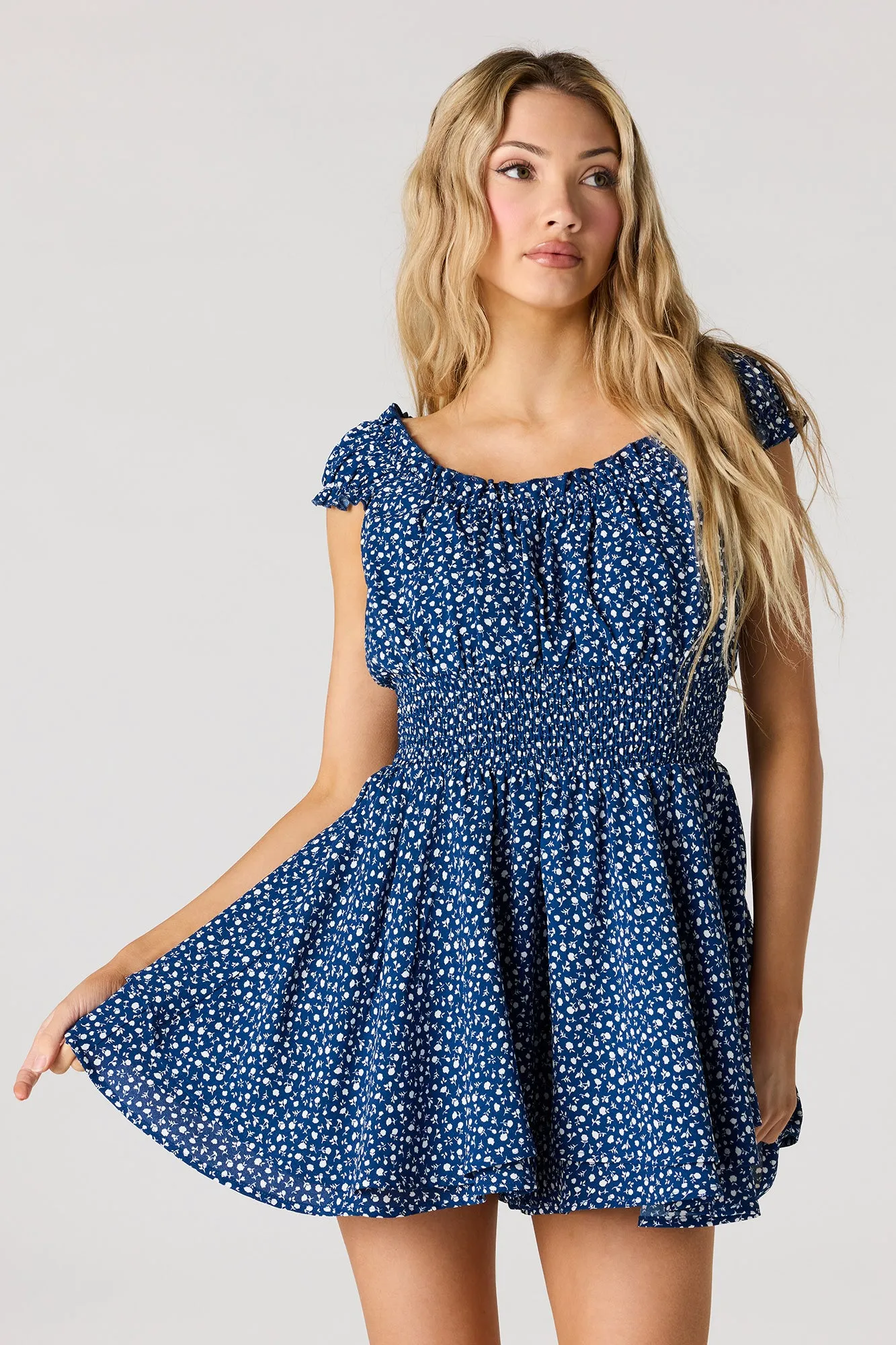 Printed Crepe Smocked Romper sold by Urban Planet