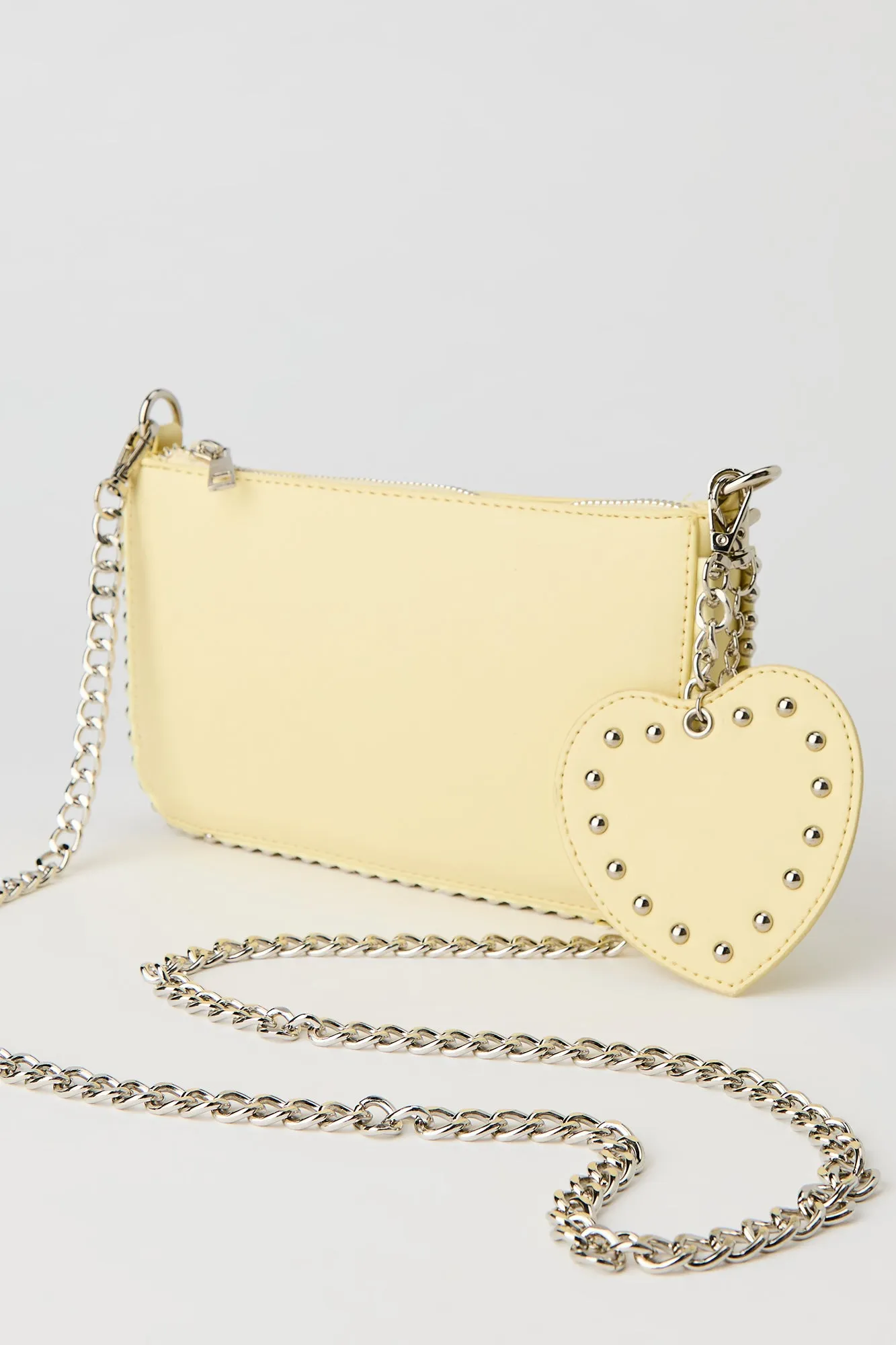 Studded Crossbody Bag with Heart Keychain sold by Urban Planet