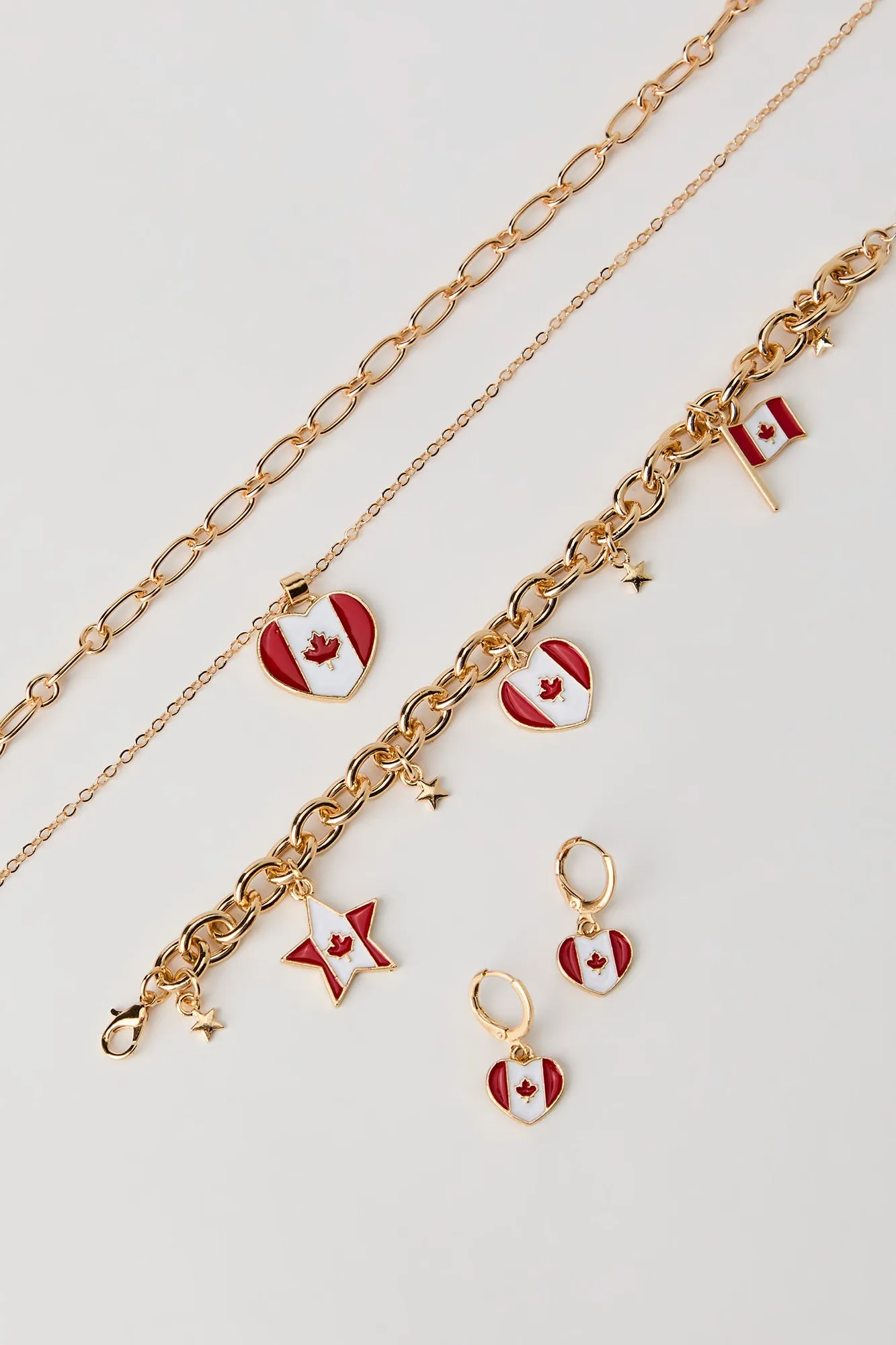 Canada Flag Earrings Necklace & Bracelet Set sold by Urban Planet