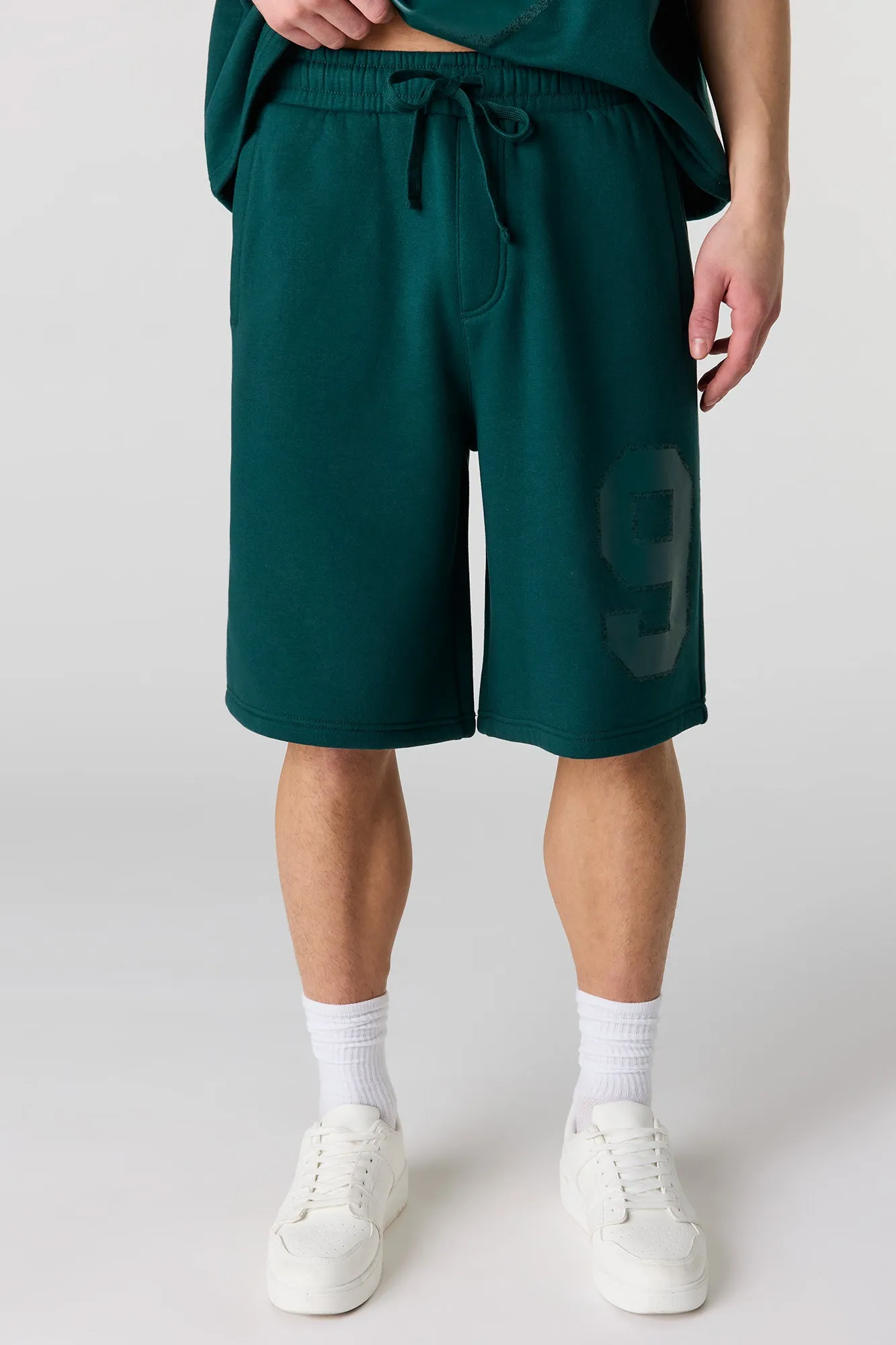 Number Graphic Baggy Fleece Short sold by Urban Planet