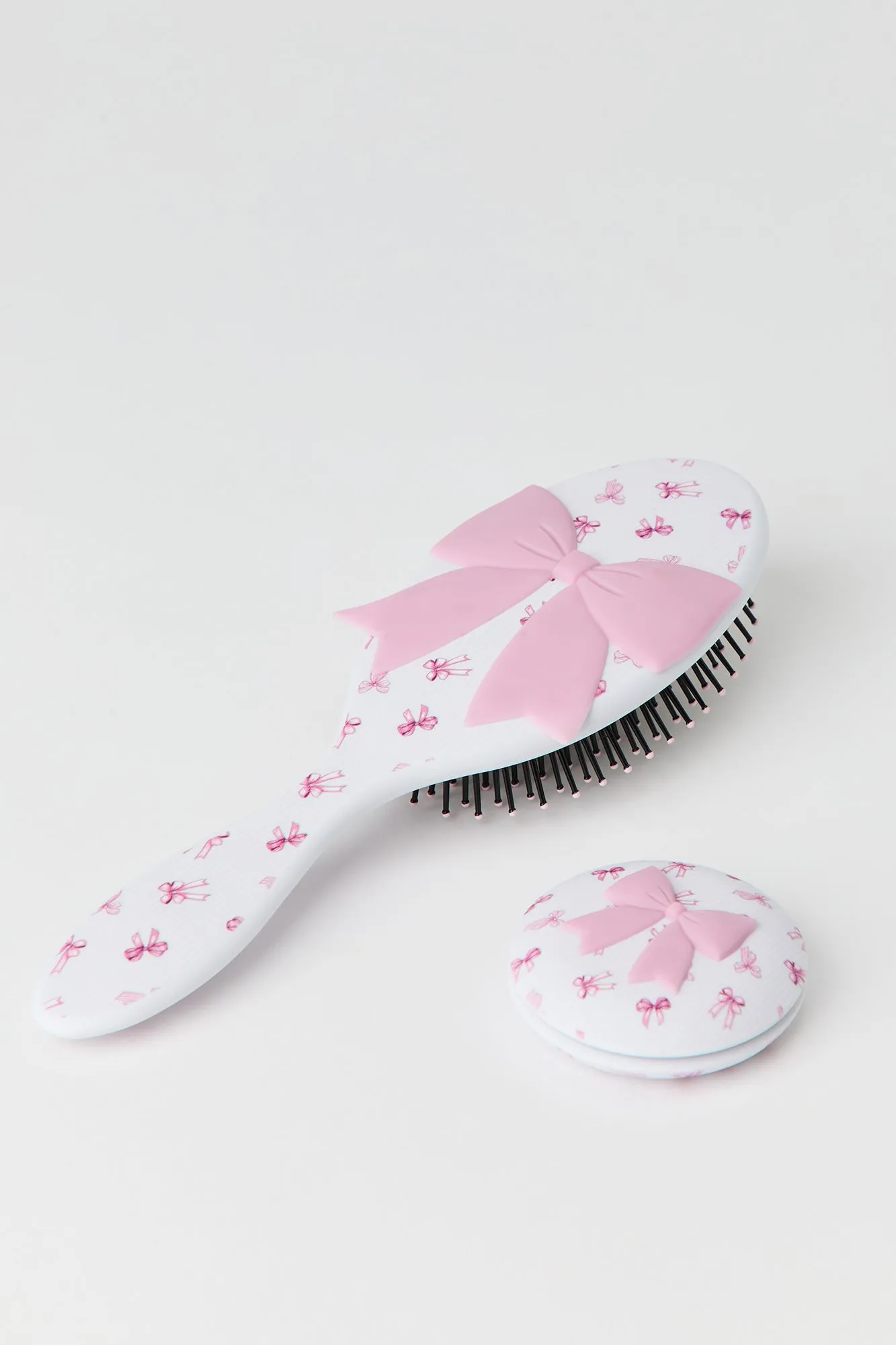 Hair Brush & Compact Mirror Set sold by Urban Planet
