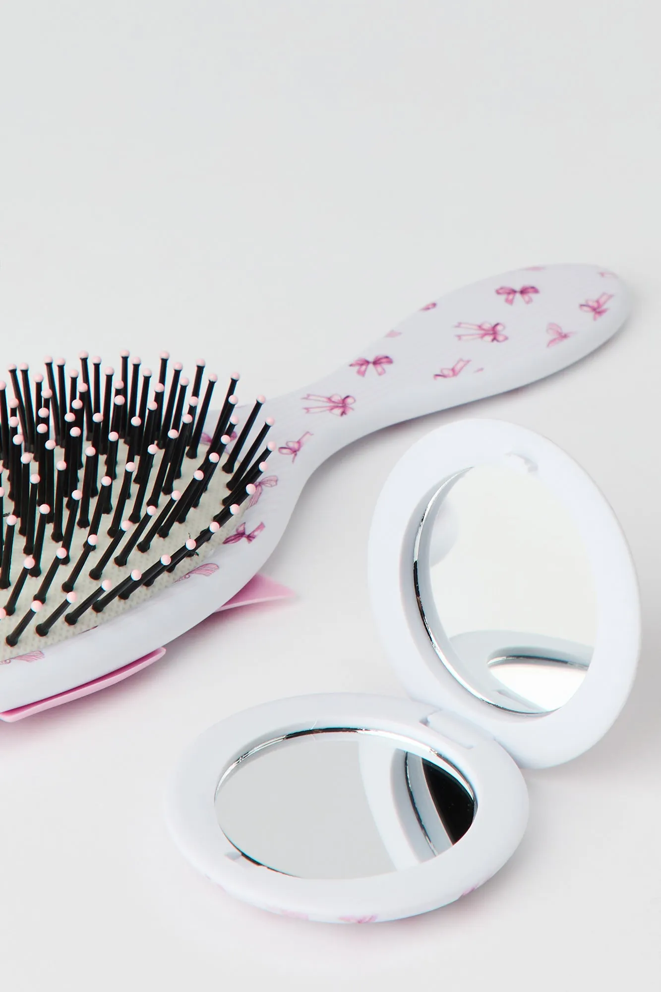 Hair Brush & Compact Mirror Set sold by Urban Planet product image thumbnail 2