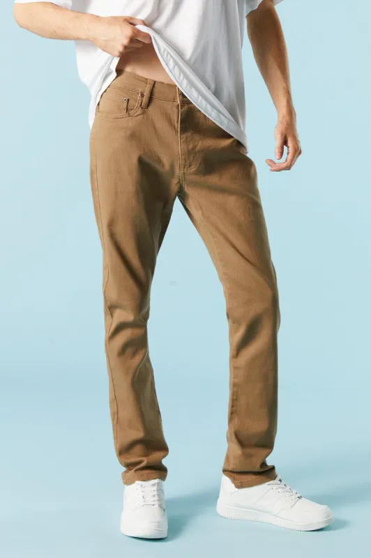 Jean mince en denim havane sold by Urban Planet