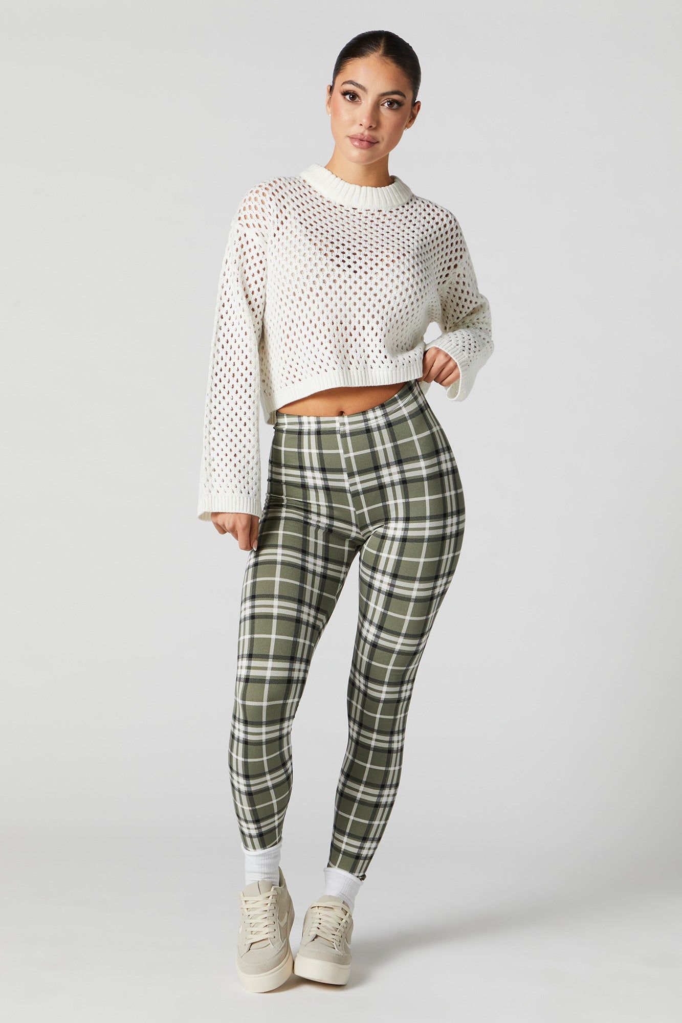 Legging en molleton à carreaux verts sold by Urban Planet