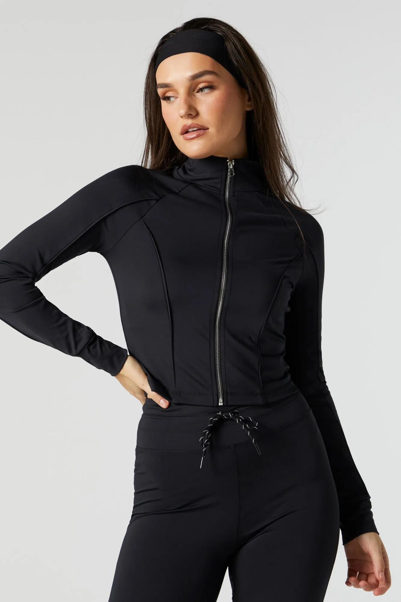 Haut Active à manches longues avec fermeture à glissière noir sold by Urban Planet