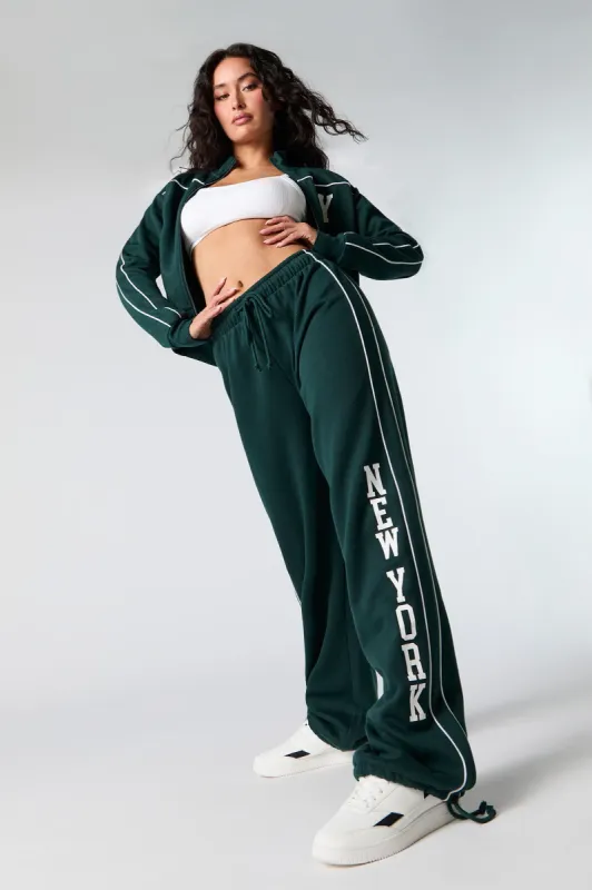 Pantalon à jambe large en molleton avec imprimé et attache sold by Urban Planet