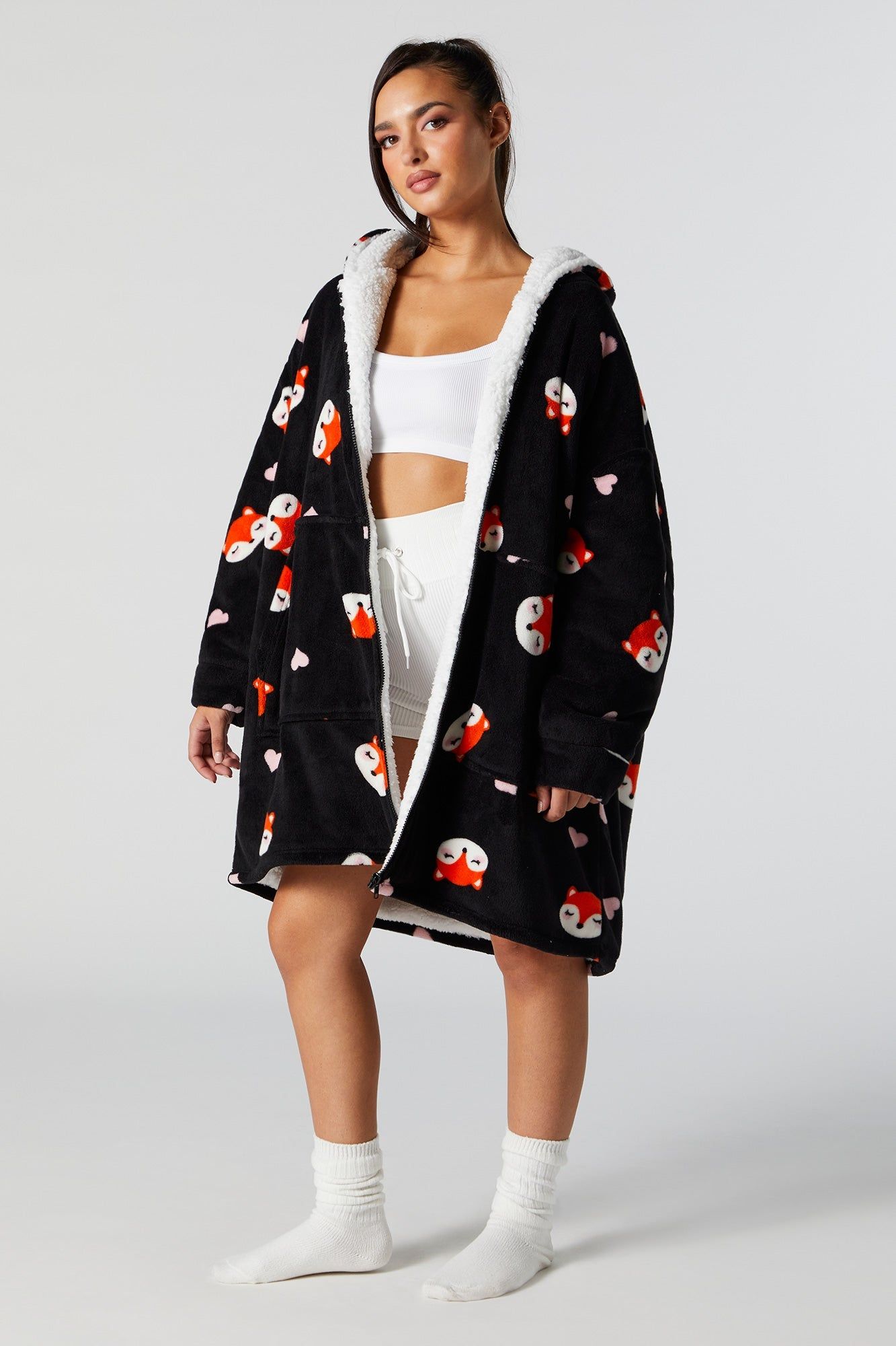 Haut surdimensionné noir avec fermeture à glissière sold by Urban Planet