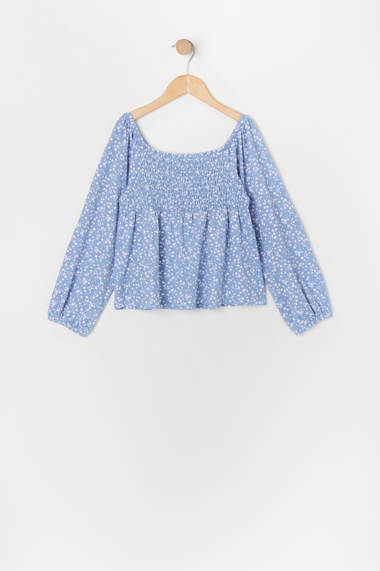 Haut smocké fleuri bleu à manches longues pour fille sold by Urban Planet