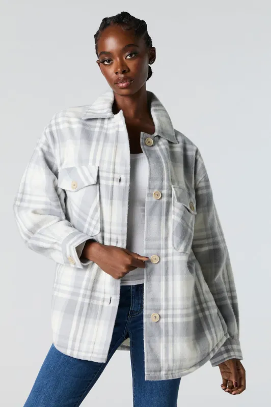 Sherpa Lined Plaid Flannel Shacket sold by Urban Planet