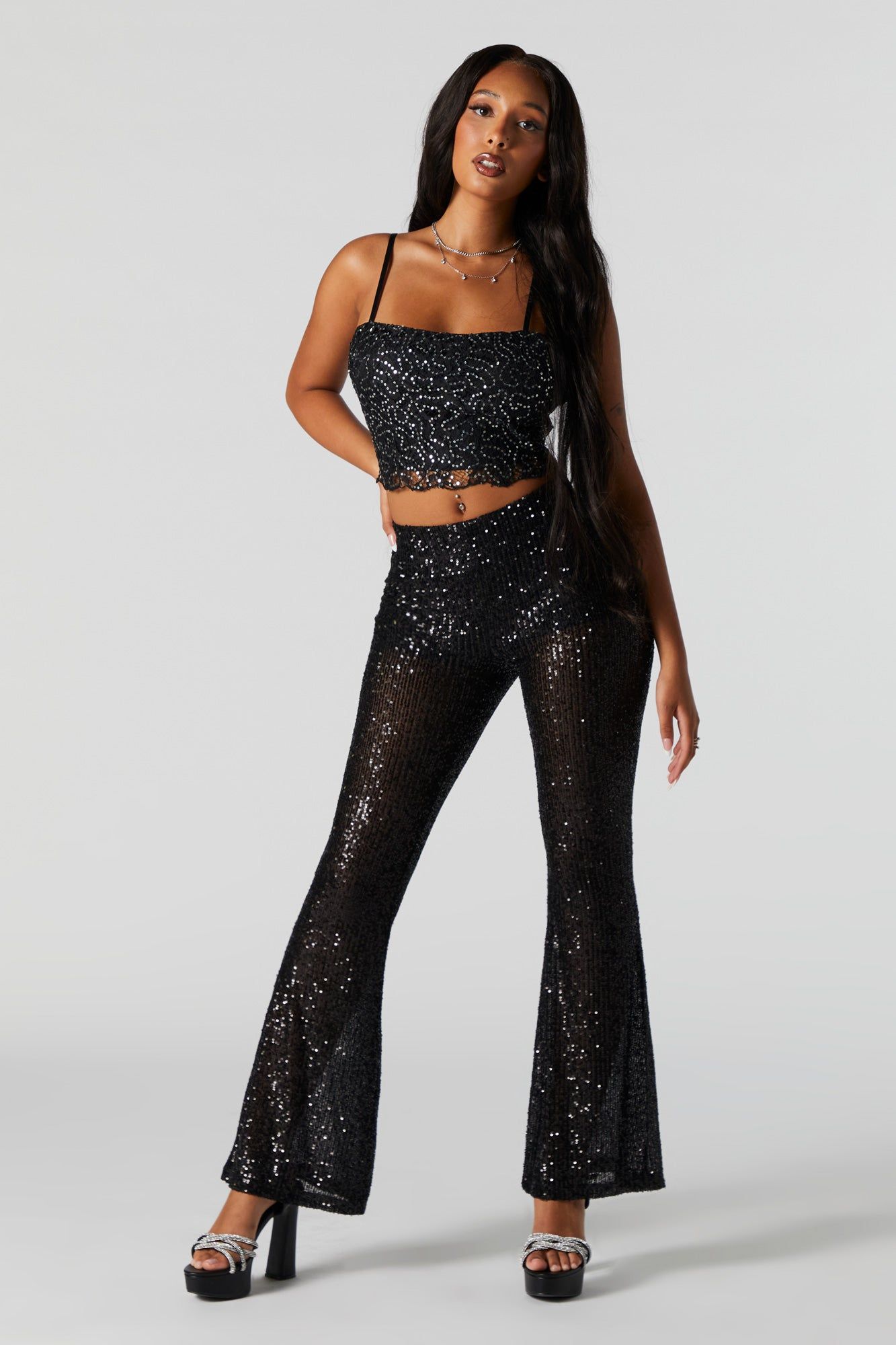 Pantalon à jambe évasée avec paillettes sold by Urban Planet