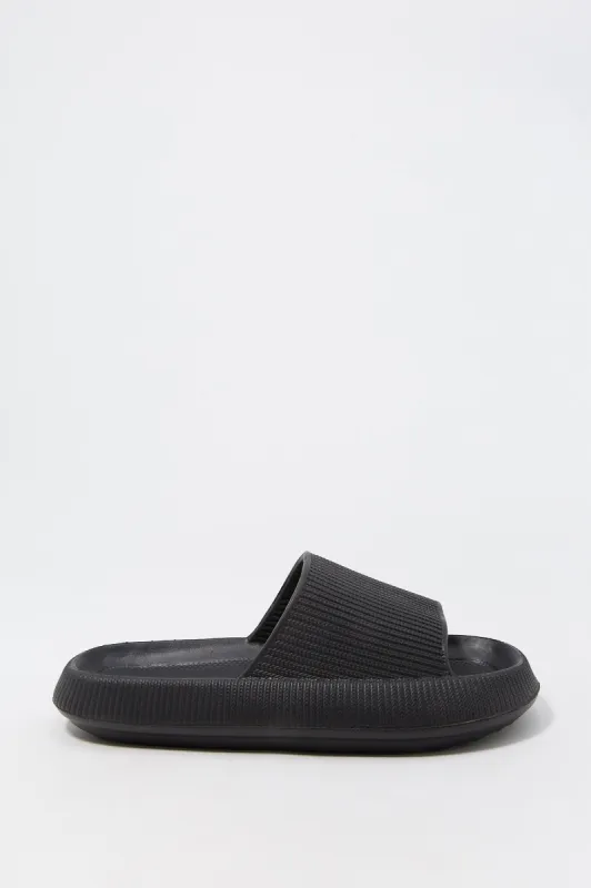 Mules éponge noir sold by Urban Planet