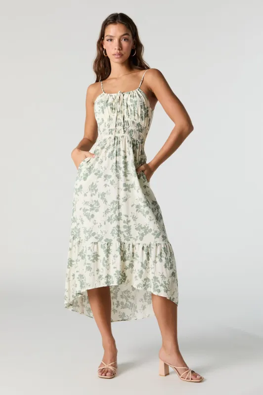 Robe midi asymétrique de style laitière sans manches fleurie sold by Urban Planet