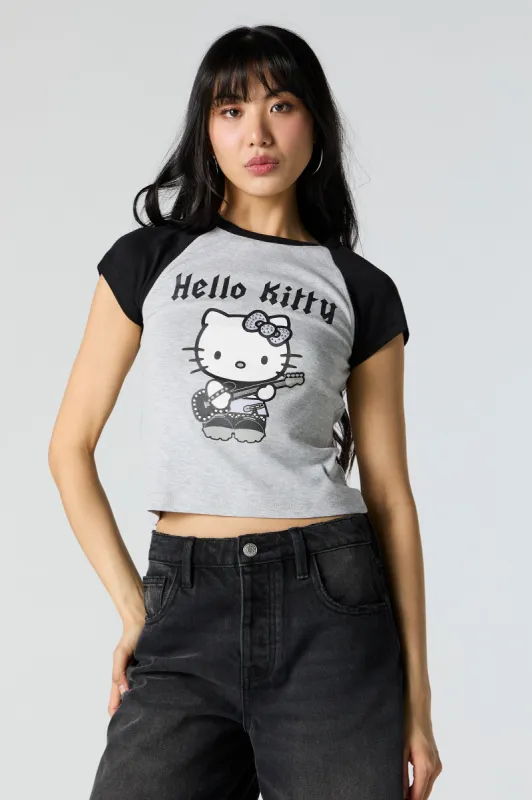 Hello Kitty Rocker Rhinestone Graphic Raglan T-Shirt sold by Urban Planet