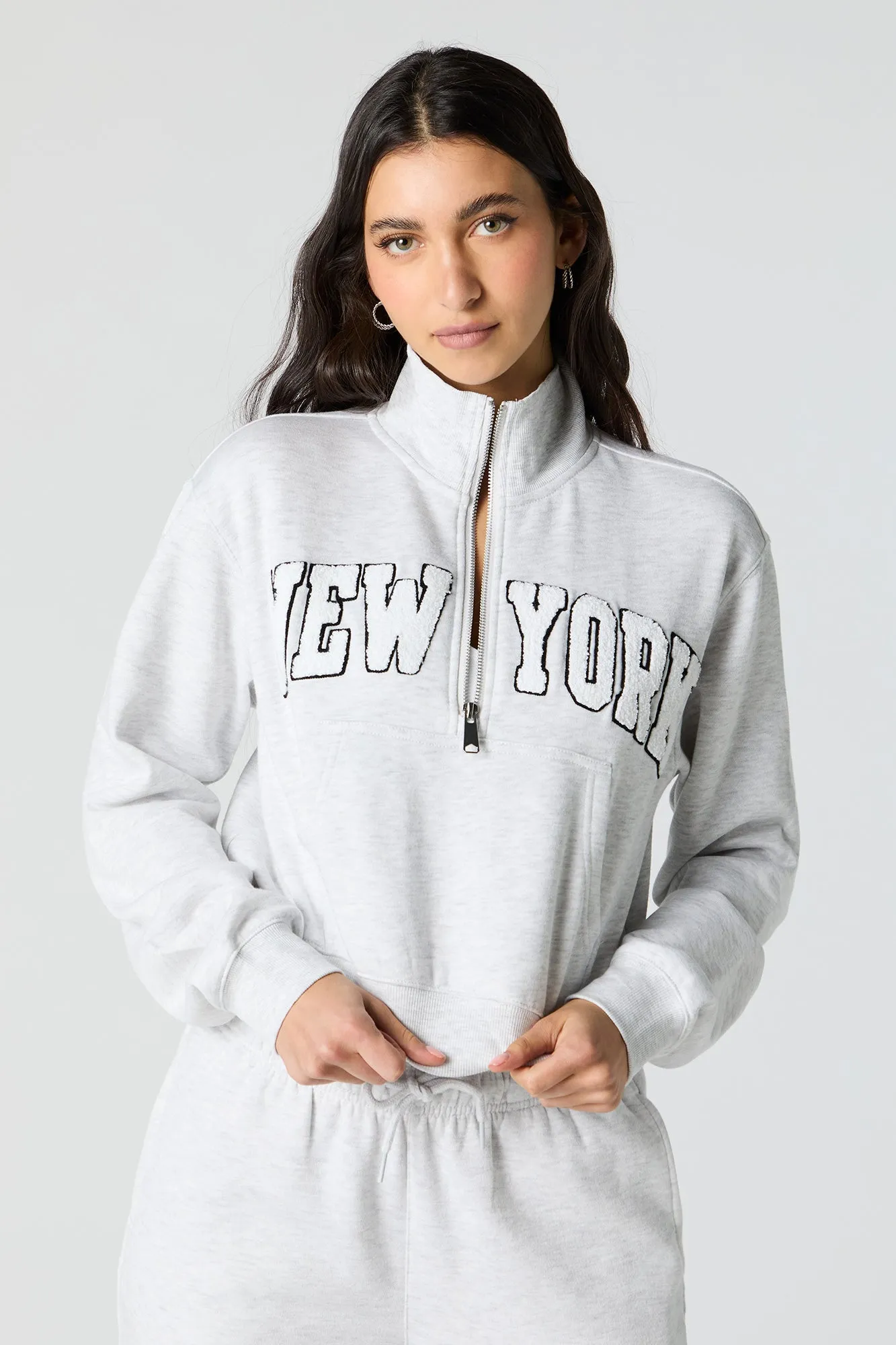 New York Chenille Embroidered Half Zip Fleece Sweatshirt sold by Urban Planet