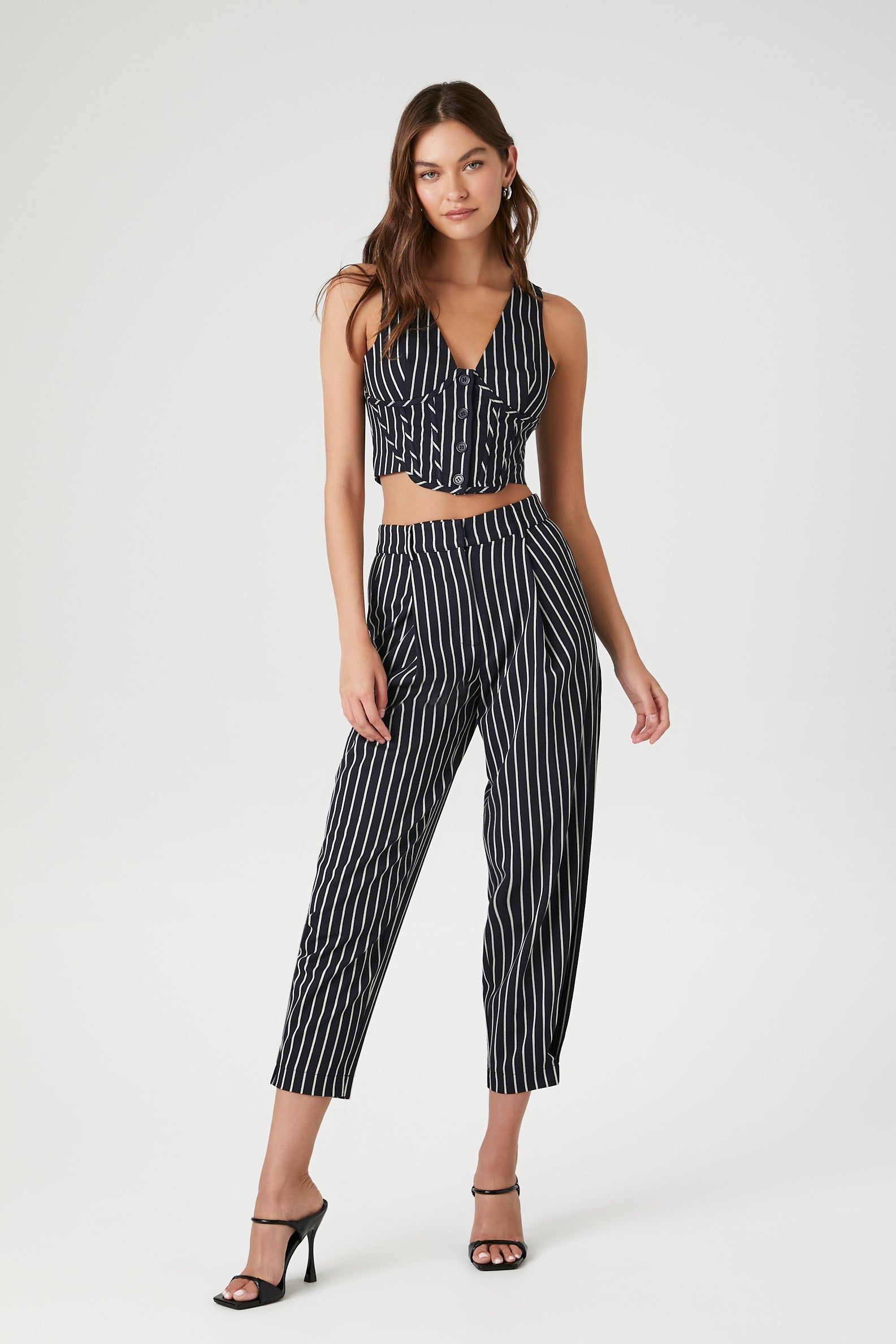 Pantalon à taille haute et fines rayures sold by Urban Planet