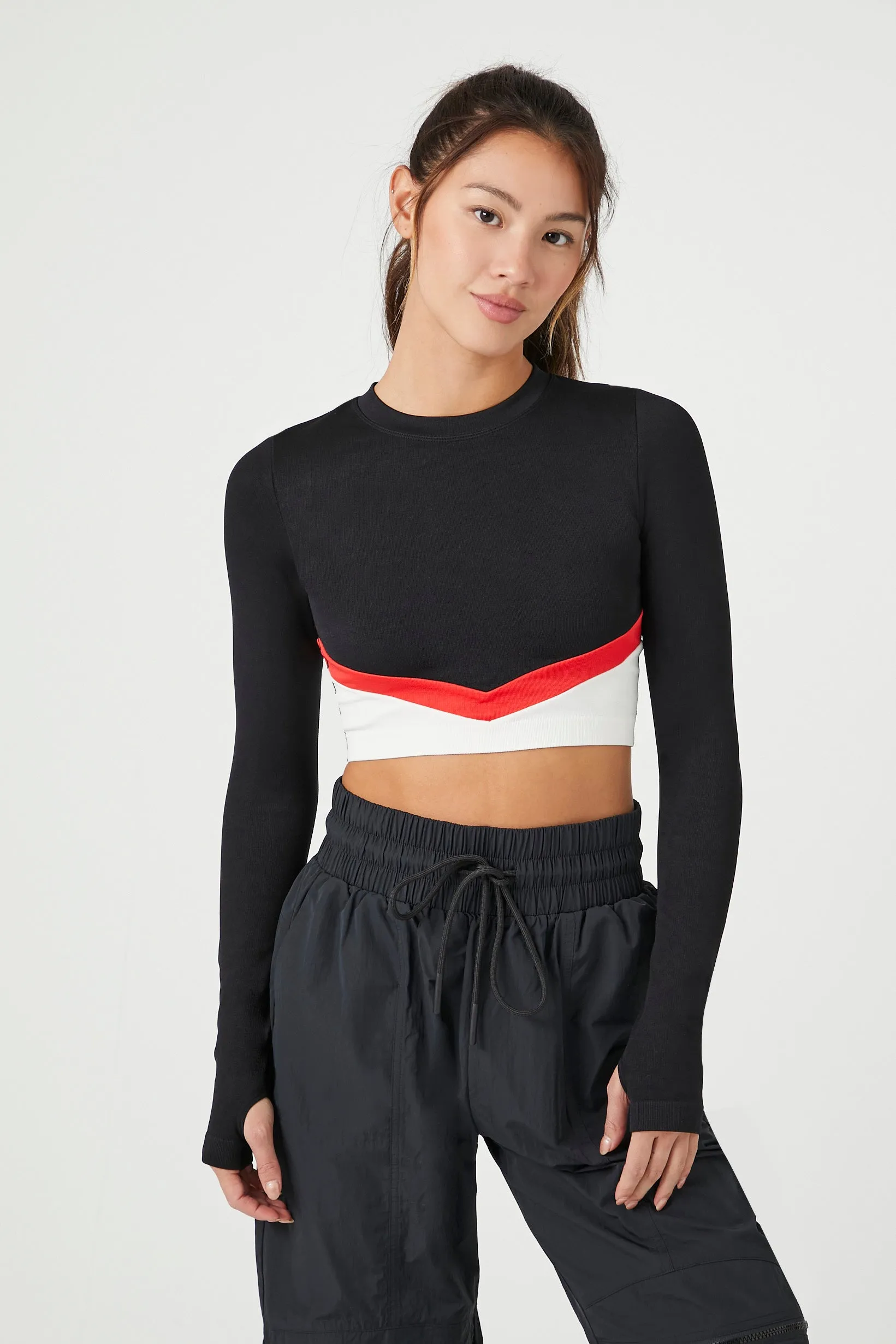 Haut écourté sans couture avec trou pour les pouces Active sold by Urban Planet