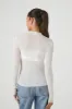 Haut en tricot semi-diaphane à manches longues avec col cheminée sold by Urban Planet
