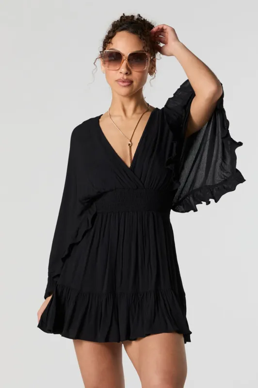 Surplice Bell Sleeve Flowy Romper sold by Urban Planet