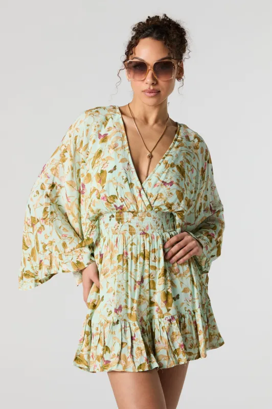 Butterfly Leaf Print Surplice Bell Sleeve Flowy Romper sold by Urban Planet