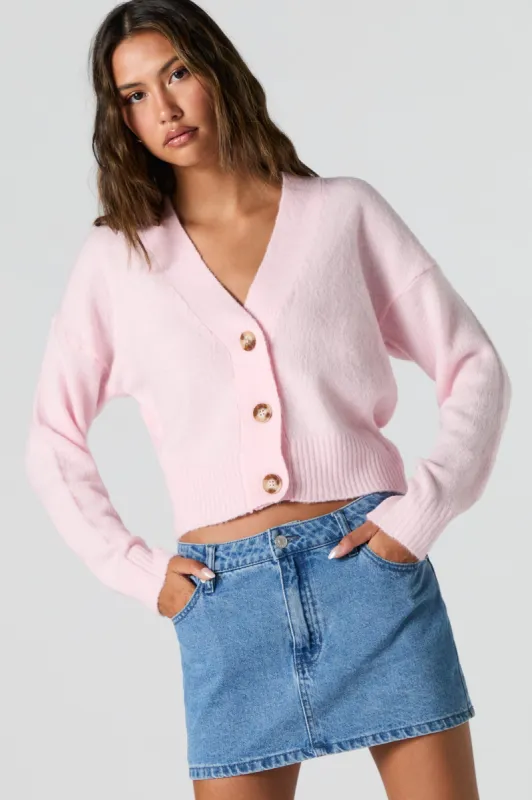 Cardigan boutonné en tricot pelucheux sold by Urban Planet