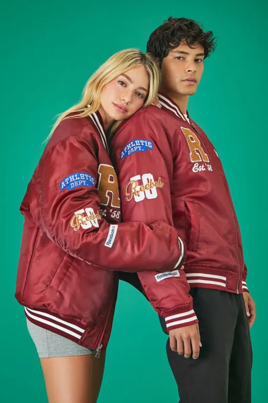 Unisex Reebok Varsity Striped Bomber Jacket sold by Urban Planet