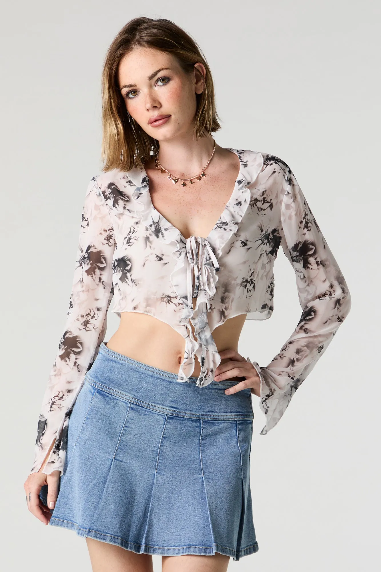 Mesh Ruffle Tie Front Long Sleeve Crop Top sold by Urban Planet