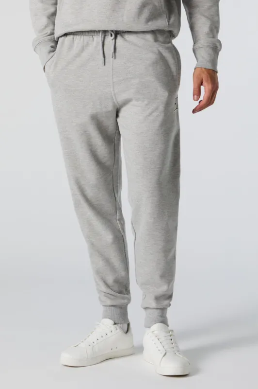 Jogger en molleton avec motif brodé Destination sold by Urban Planet