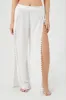 Pantalon couvre-maillot avec fente et pompons sold by Urban Planet