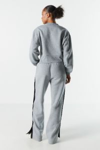 Pantalon boutonné en molleton rayé sold by Urban Planet