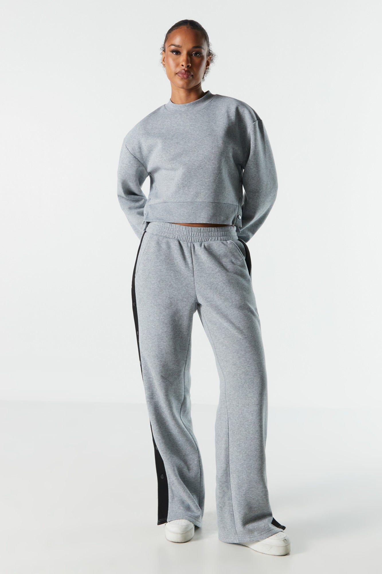 Pantalon boutonné en molleton rayé sold by Urban Planet