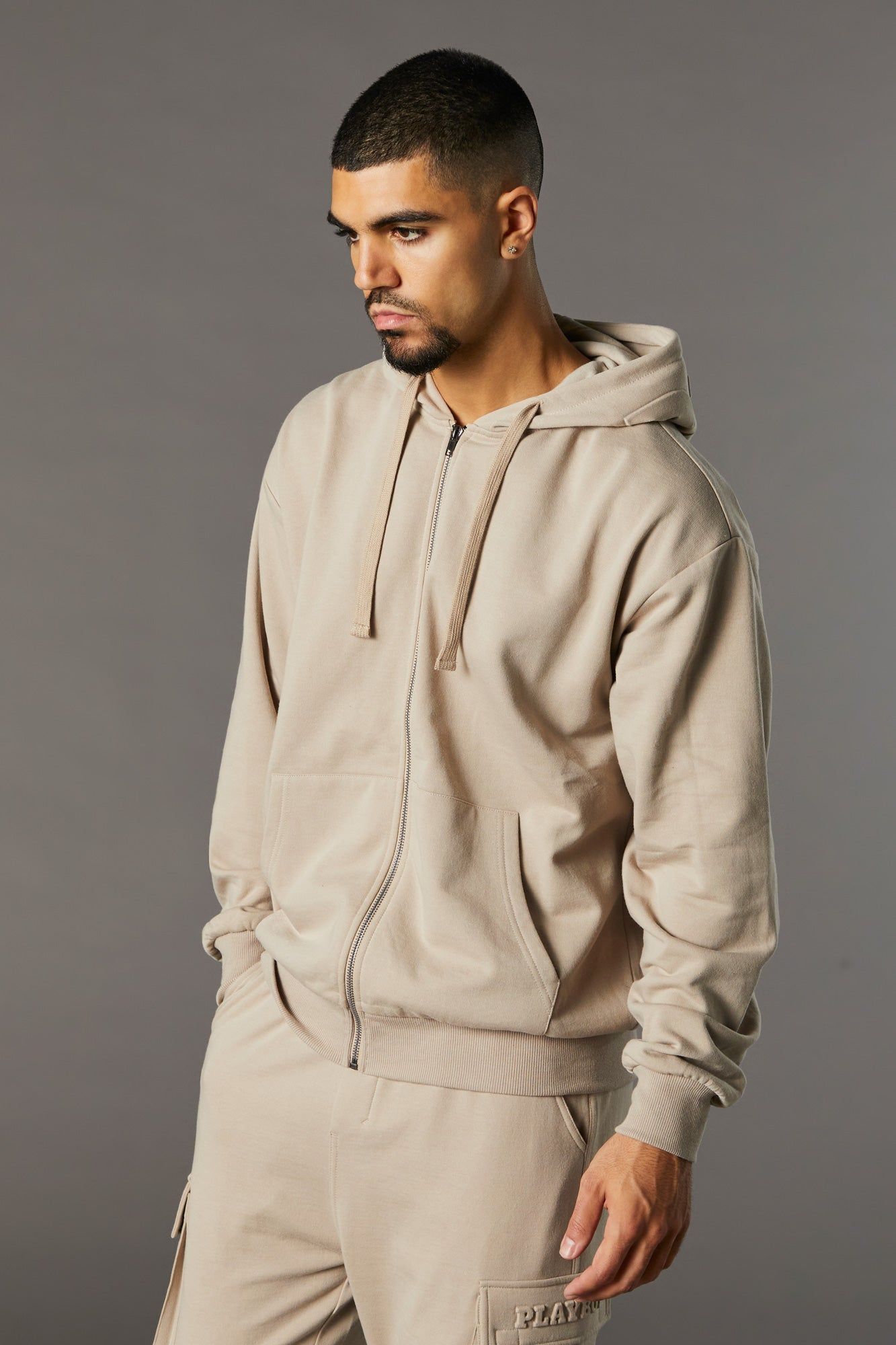 Playboy Embossed Zip-Up Hoodie sold by Urban Planet