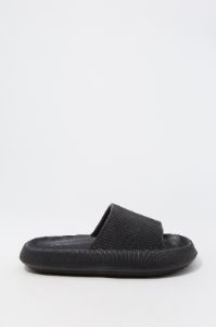 Mules éponge noir sold by Urban Planet