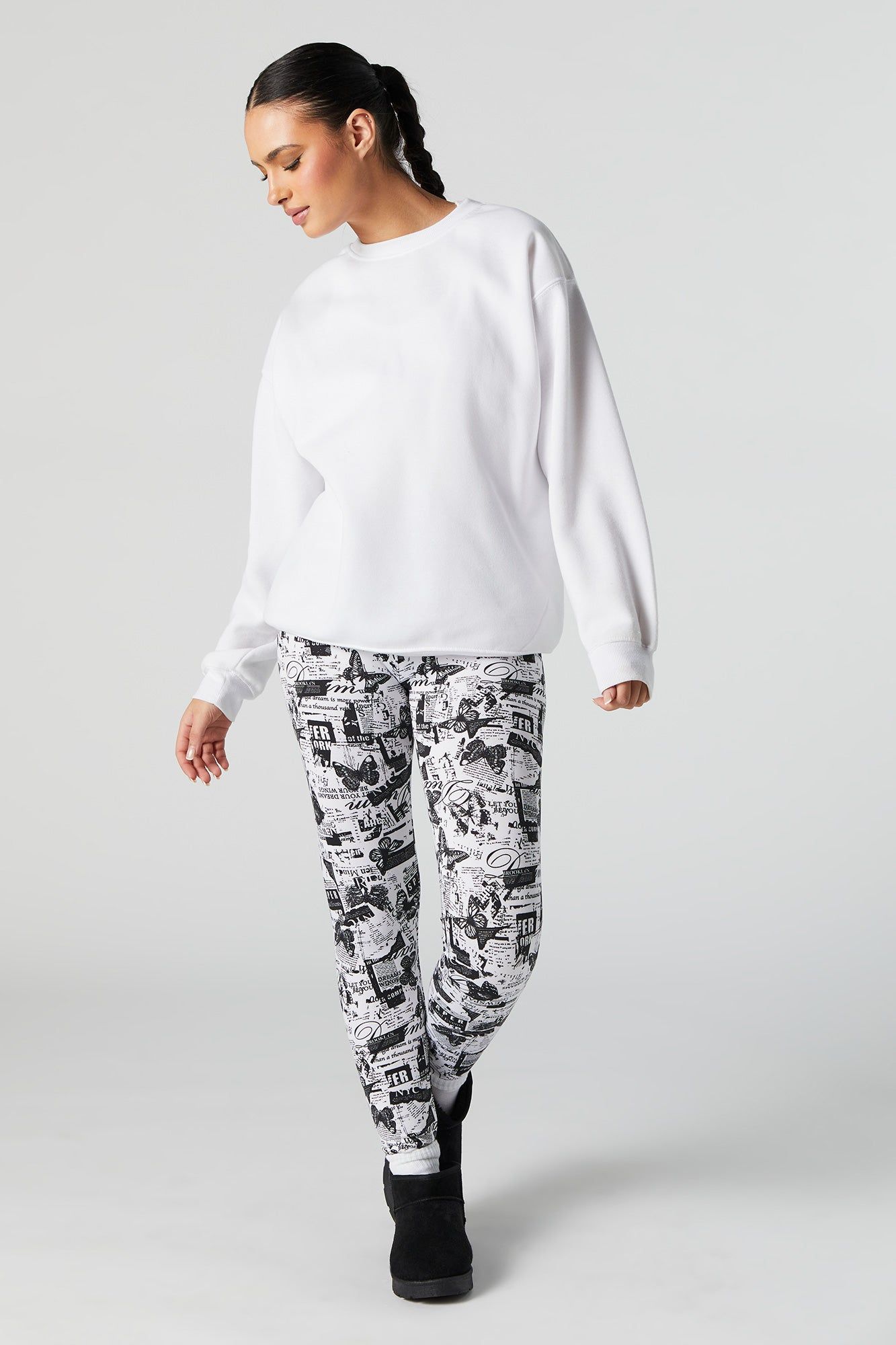 Newspaper Print Fleece Legging sold by Urban Planet