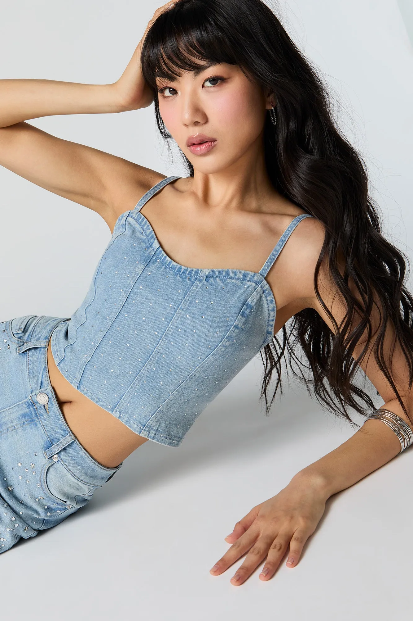 Haut corset en denim avec pierres du Rhin sold by Urban Planet